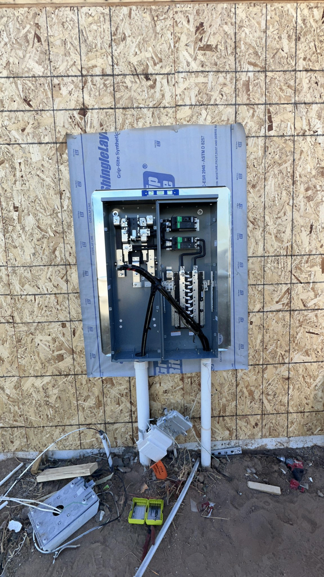 Service entrance cover with feeder conductors