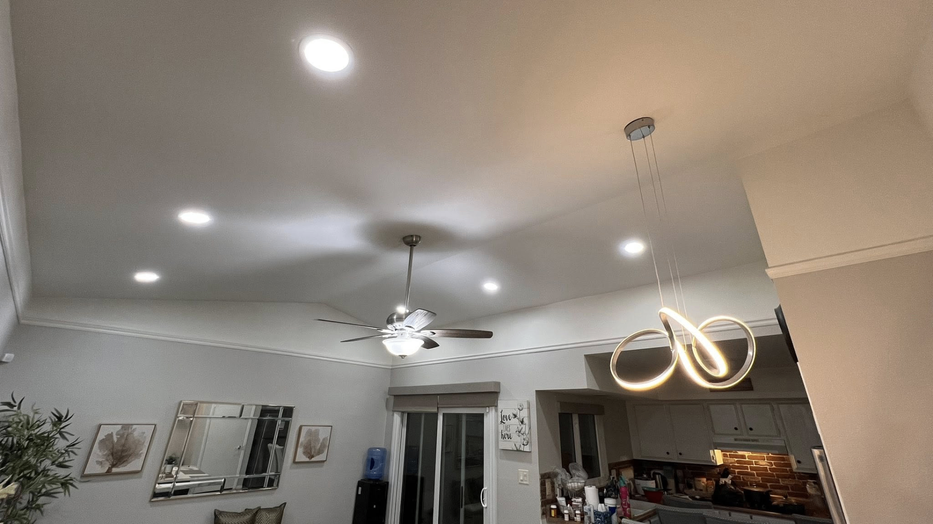 Vaulted ceiling recessed lighting and pendant